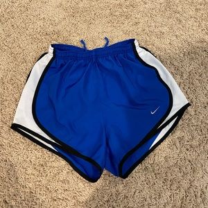Blue and white Nike Dri-fit running shorts